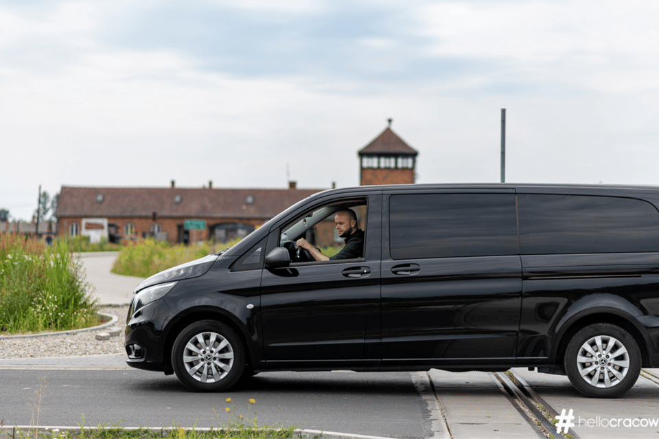 From Krakow: Auschwitz-Birkenau Guided Tour Guaranteed Time - Auschwitz I: entering through Arbeit macht frei and seeing preserved evidence