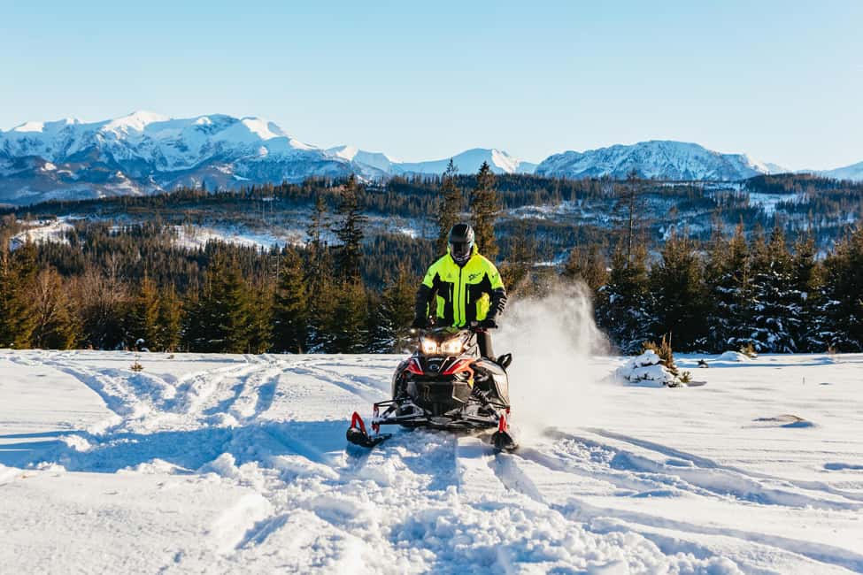 From Krakow: Snowmobile Adventure with Thermal Pools Visit - Chochołów wooden village and the viewpoint stops for Tatra views