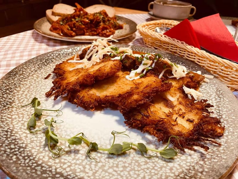 Krakow: 6-Course Full Polish Food Tour with Vodka Tasting - Meeting at St. Mary’s Basilica, Blue Umbrella, and the Evening Rhythm