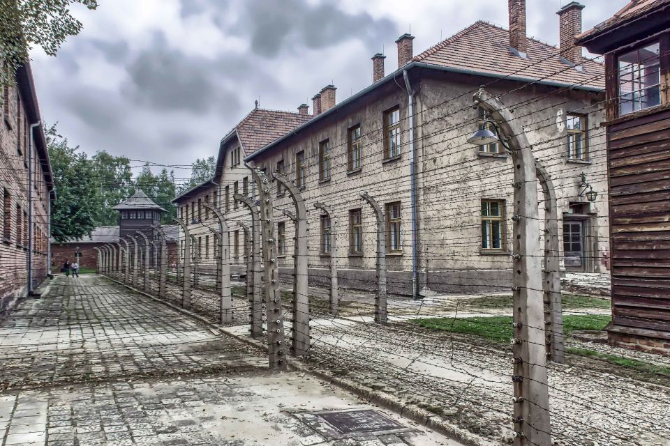 Krakow: Auschwitz Birkenau Museum Guided Tour with Pickup - Stop 2 on the Clock: The Coach Leg to Auschwitz