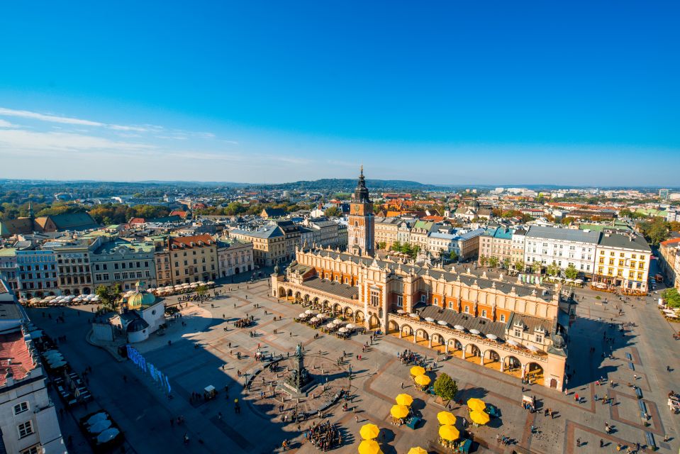 Krakow: City Sightseeing Tour by Electric Golf Cart - Meeting point at Matejki Square: find the yellow buggy fast