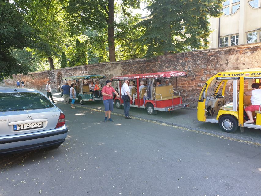Krakow: City Sightseeing Tour Eco Electric Buggy Golf Cart - Getting the story in more than one way: live guide plus multilingual audio
