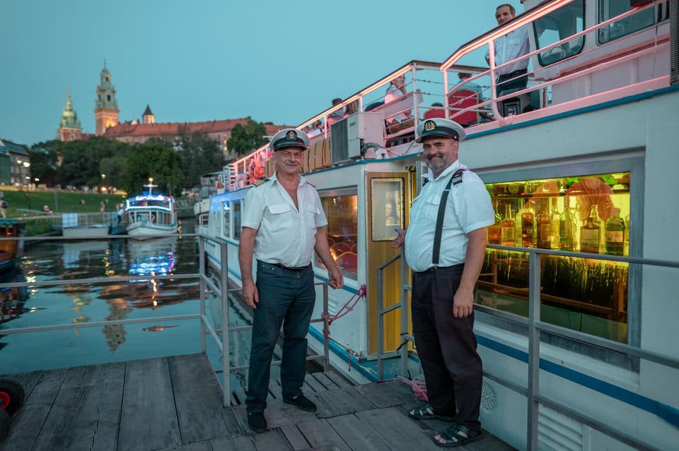 Kraków: Evening or Night River Cruise - Deck choice in real weather: warmth, seating, and where you’ll sit