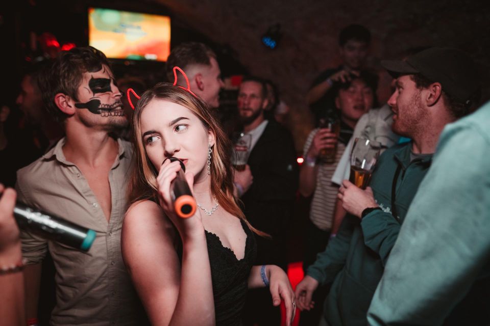 Krakow: Pub Crawl with 1 Hour of Unlimited Alcoholic Drinks - Drinking games and the magic show: how the night stays friendly