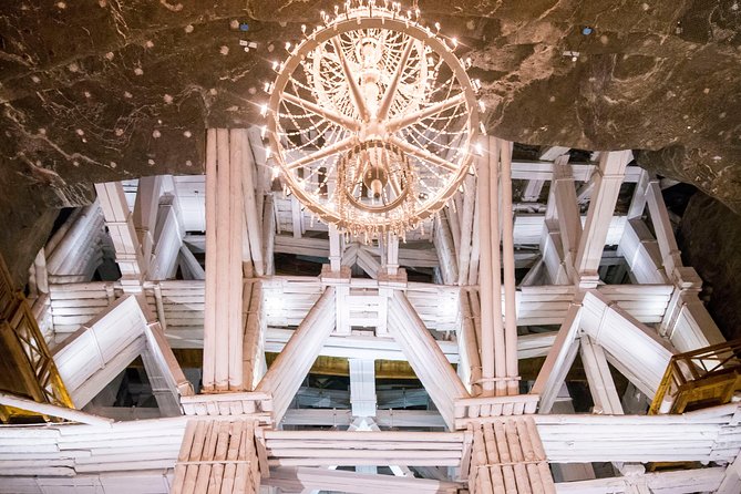 Krakow to Wieliczka: Salt Mine Guided Tour with Ticket & Transfer - Entering the mine: your route through chambers, lakes, and salt monuments
