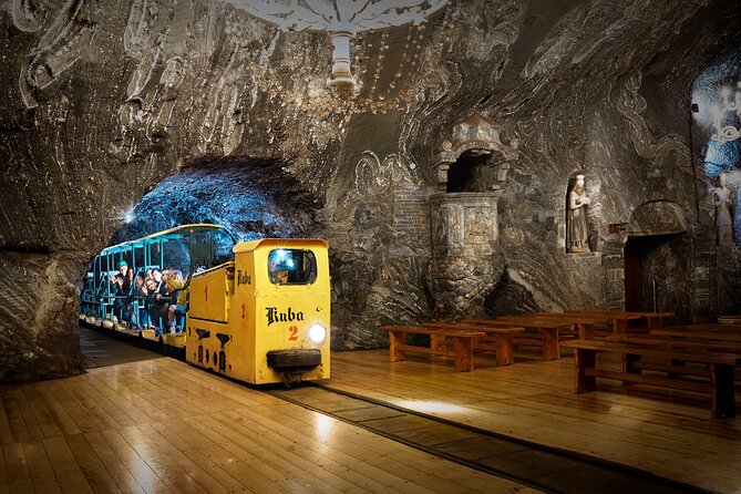 Krakow: UNESCO Bochnia Salt Mine Tour & Boat Expedition - Entering the mine: elevator, audioguide, and multimedia that actually helps
