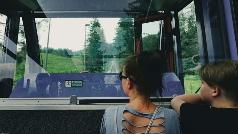 Krakow: Zakopane Cable Car, Spirits, Tasting & Thermal Baths - Chochołów Village: Wooden Architecture and a Sculptor’s House Feel