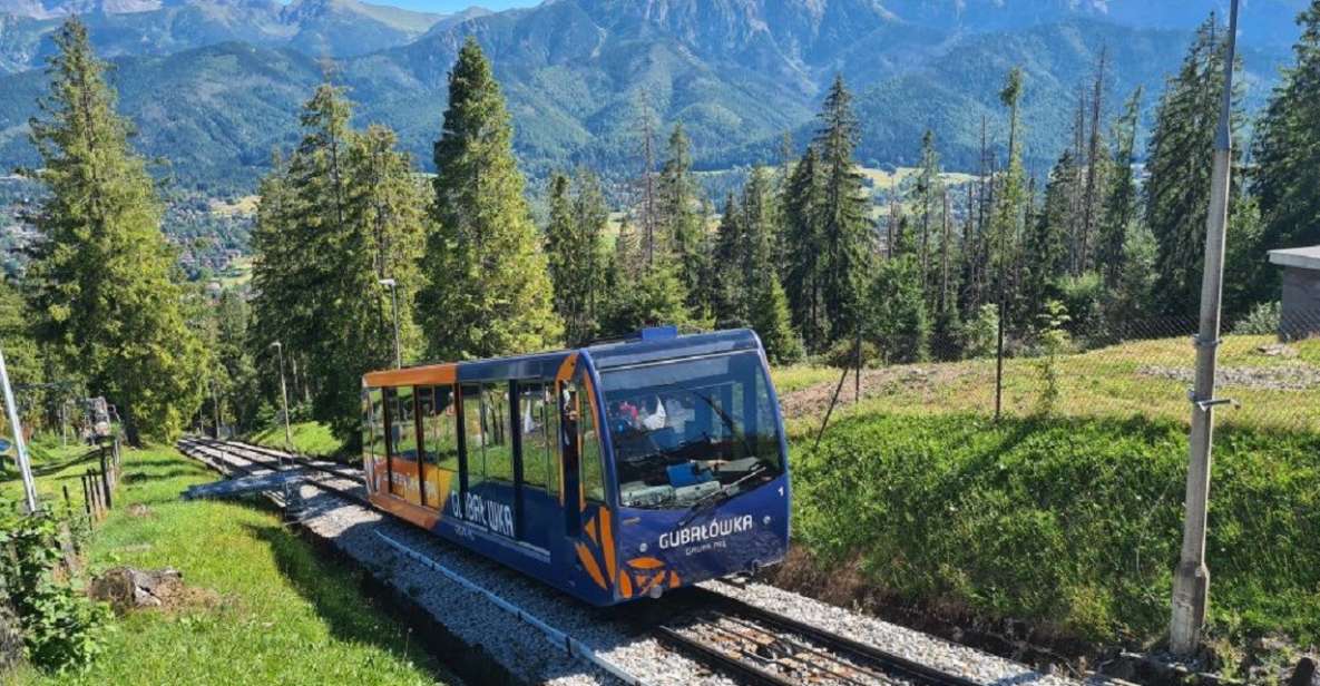 Krakow: Zakopane, Funicular, Cheese, and Highland Day Trip - Jaszczurówka’s wooden church and the Wielka Krokiew ski jump