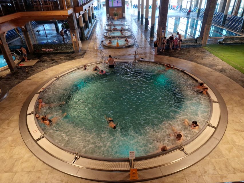 Kraków: Zakopane Tour, Thermal Pools & Hotel Pickup Options - Zakopane promenade on Krupówki Street: shopping and snack time with local energy