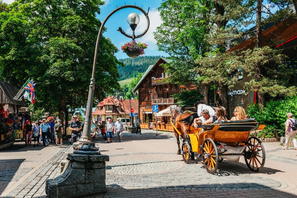 Krakow: Zakopane Tour with Thermal Baths, Cable Car & Pickup - Zakopane time on Krupówki Street: your meal and shopping window