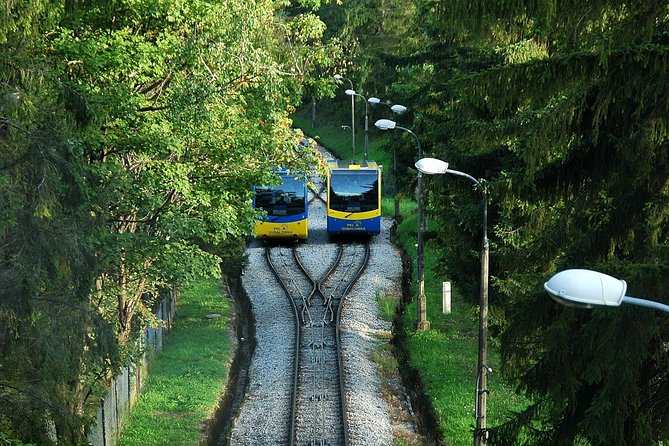 Zakopane Guied Tour: Cable Car, Local Spirits & Thermal Baths - Krupówki Street break: lunch is on you, but the choice is yours